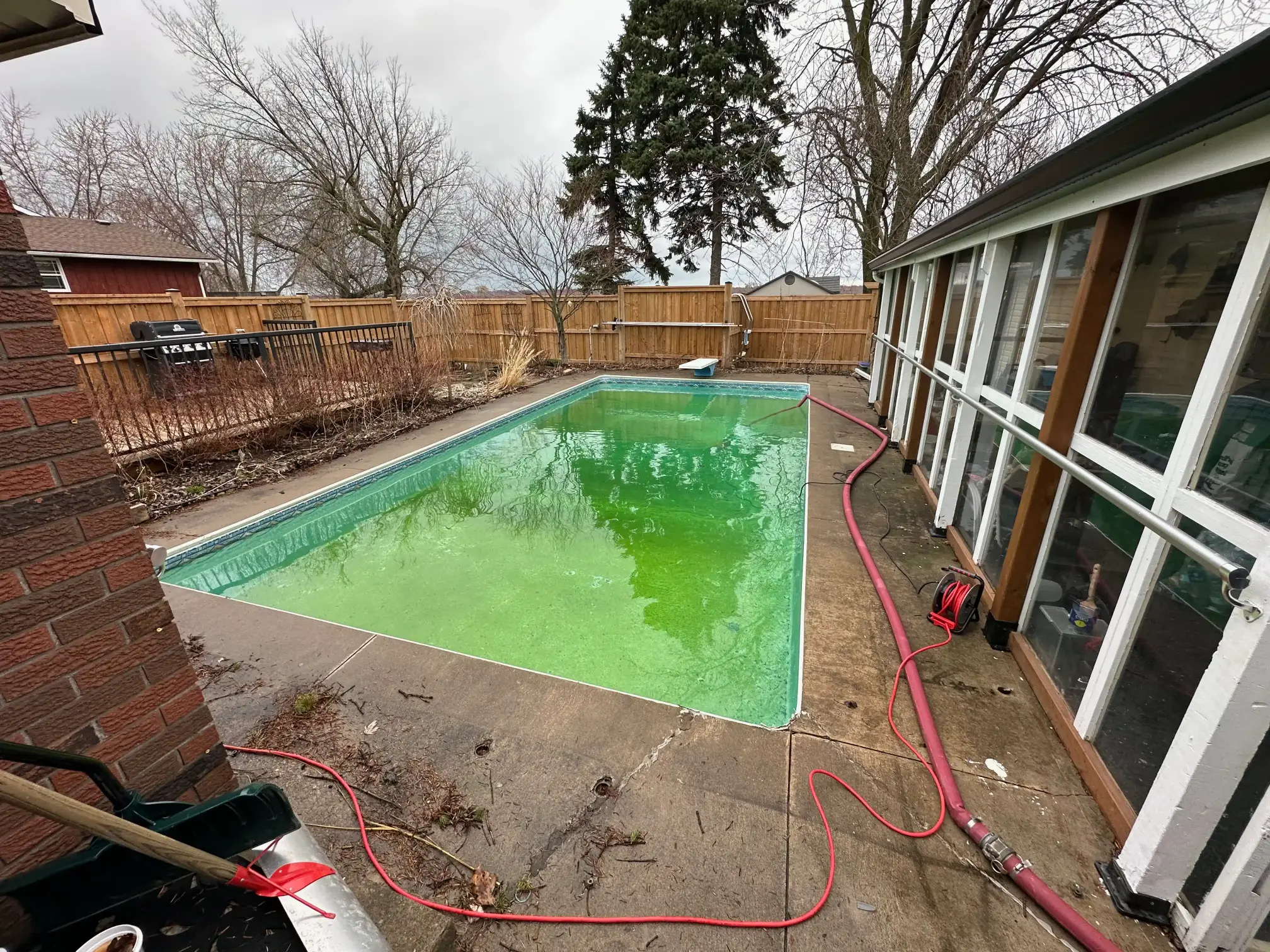 New concrete pool deck installed during backyard pool renovation in Niagara